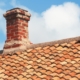 Chimney repair telford - Tile roof with brick chimney